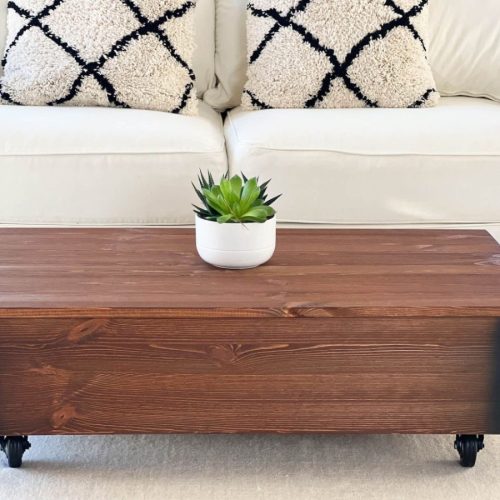Truhentisch dunkelbraun Couchtisch Vintage Optik auf Rollen