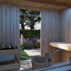 Karibu Design Saunahaus Uppsala Blackline - 68 mm Aktionssauna schwarz Ohne Terrasse 9 kW Ofen inkl. Steuergerät (finnisch)